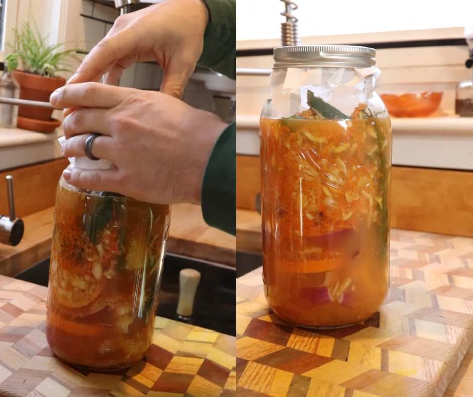 Jar filled with all the ingredients for fire cider.